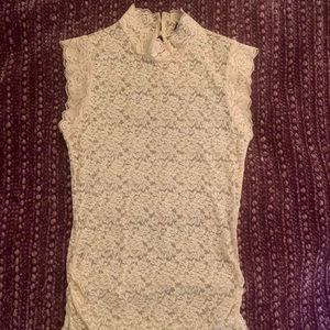 pale yellow lacey top ruched at the bottom😇